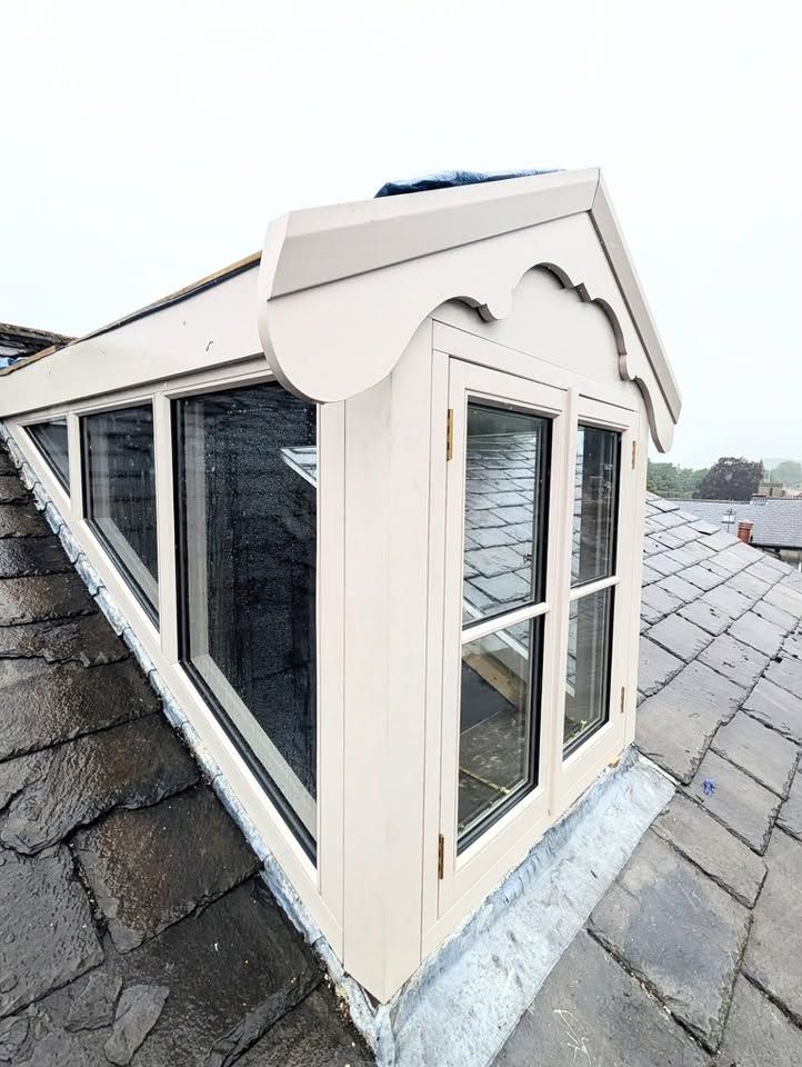 Bespoke dormer window fitted on a slate roof